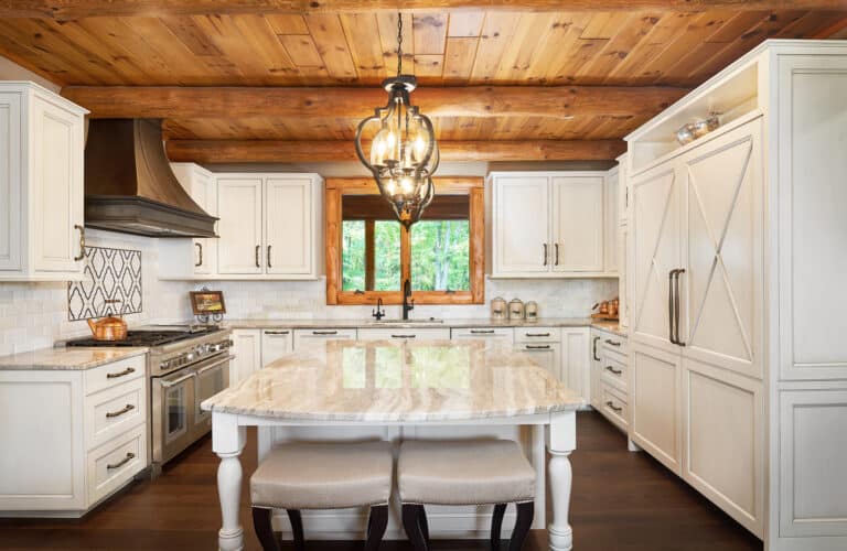 Log Cabin Kitchen with White Cabinets